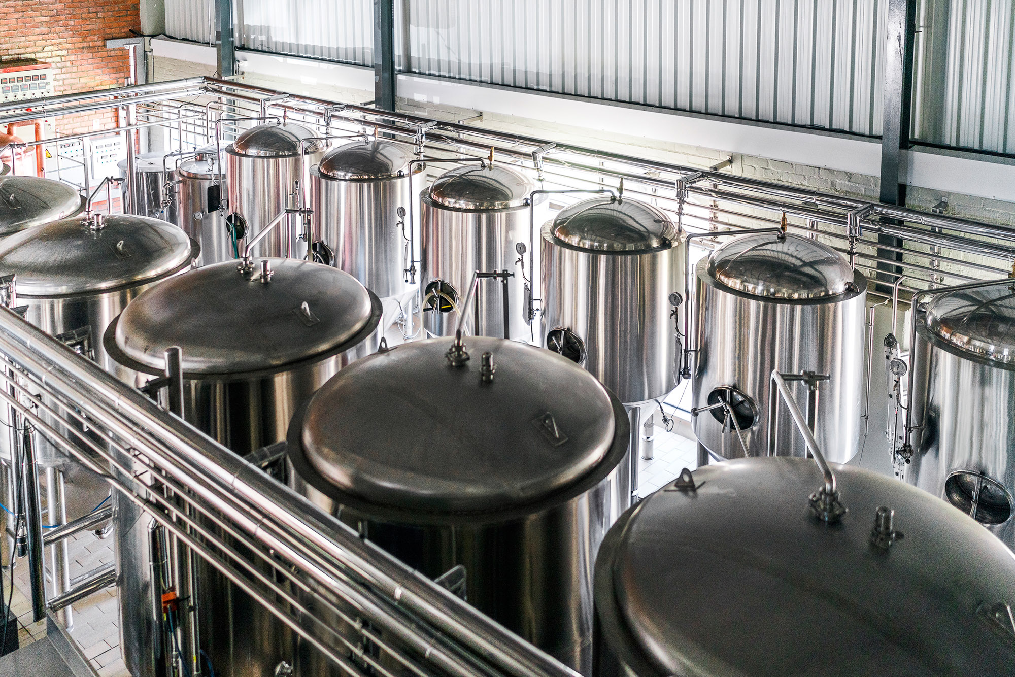 Stainless steel vats in a factory