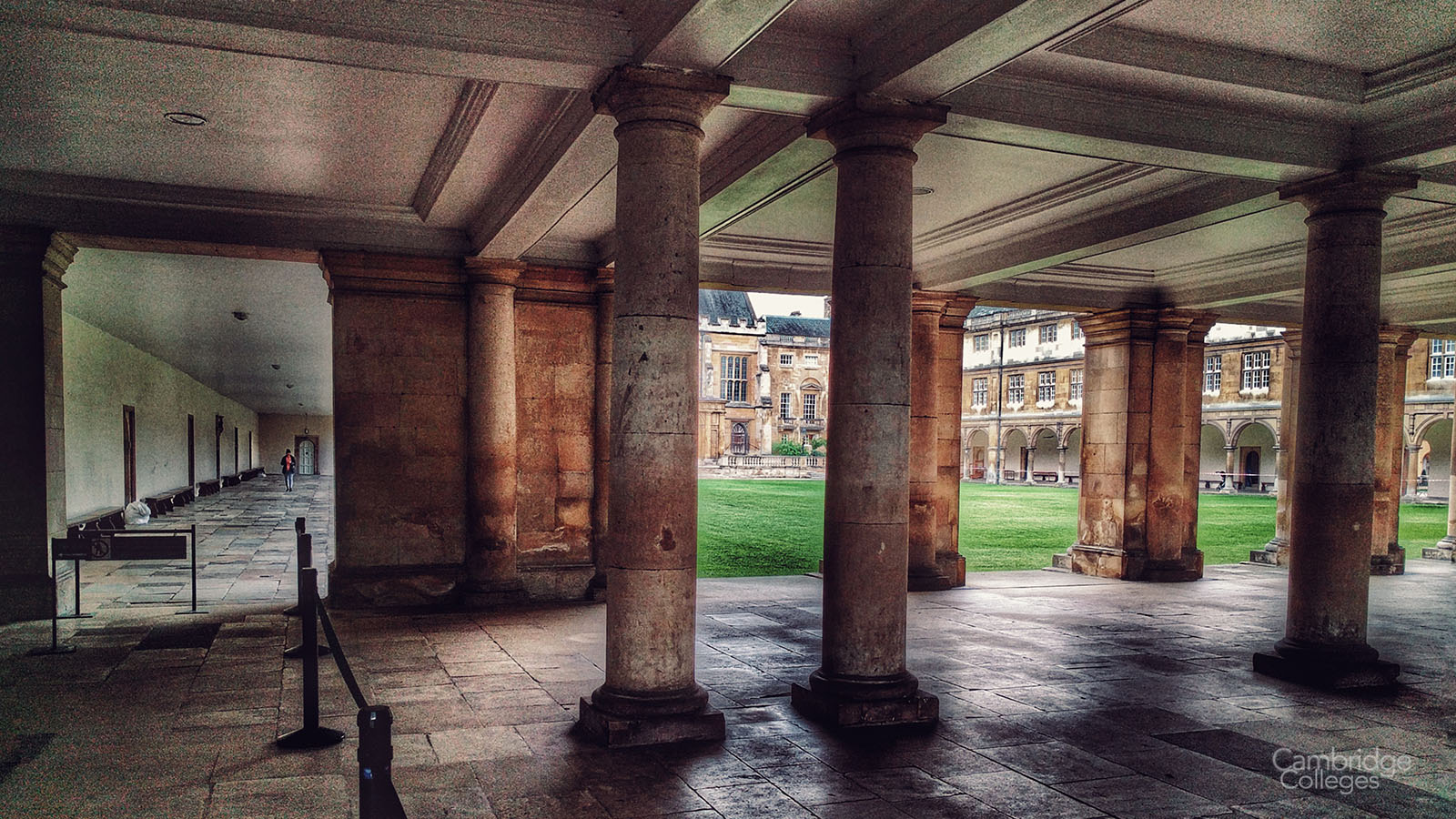 The Cloisters underneath the Wren library, looking towards Neville Court.